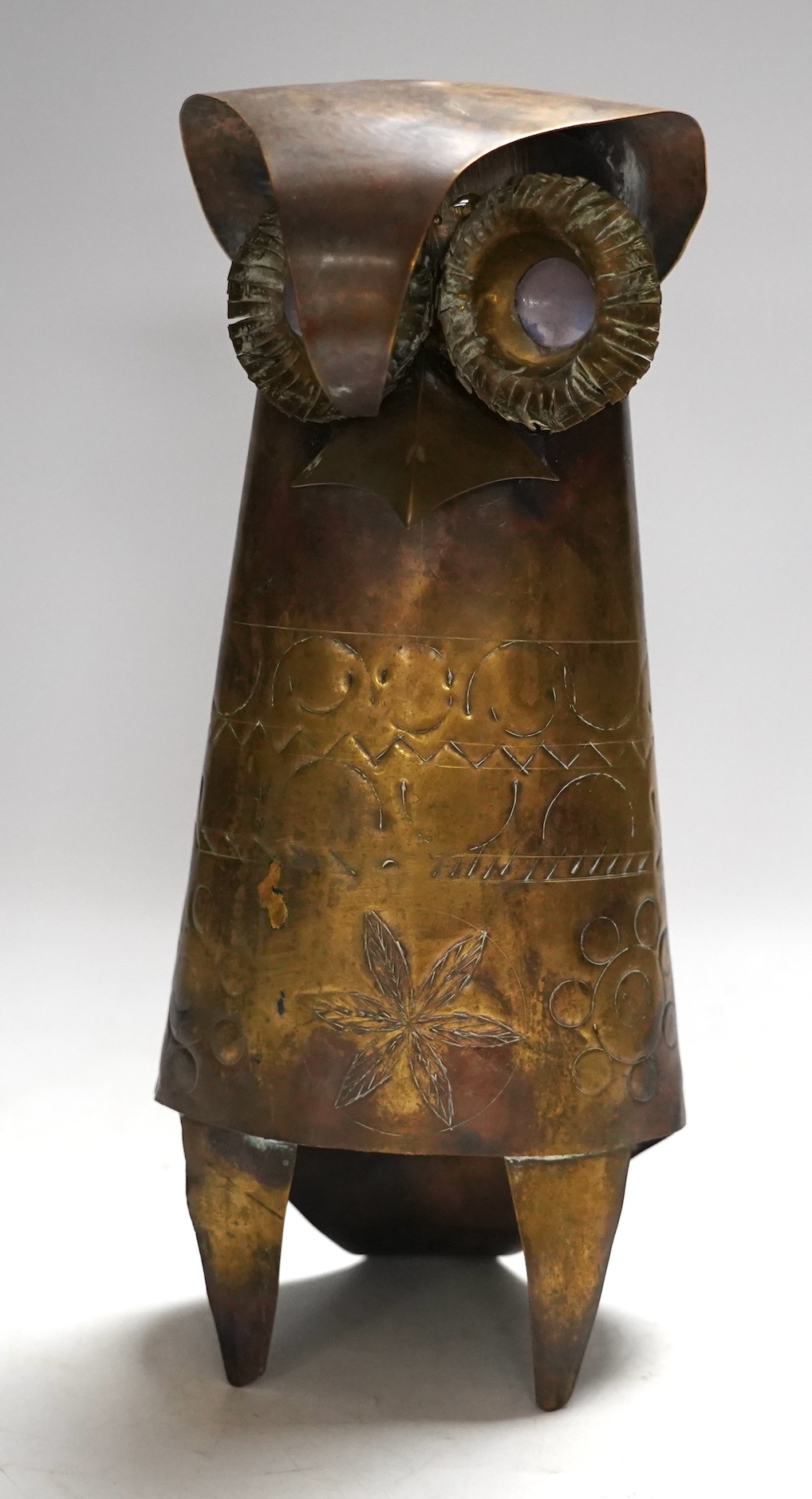 Oswaldo Guayasamin (Ecuadorian, 1919-1999), brass sculpture of an owl with cabochon set eyes, signed verso, 31cm high